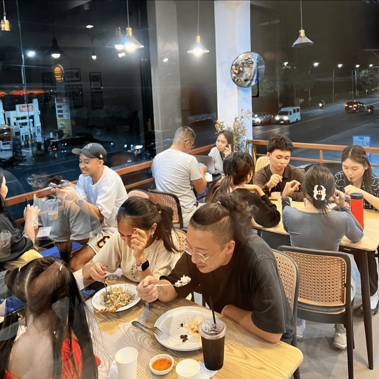 Guests dining at La Sanch Café in the evening
